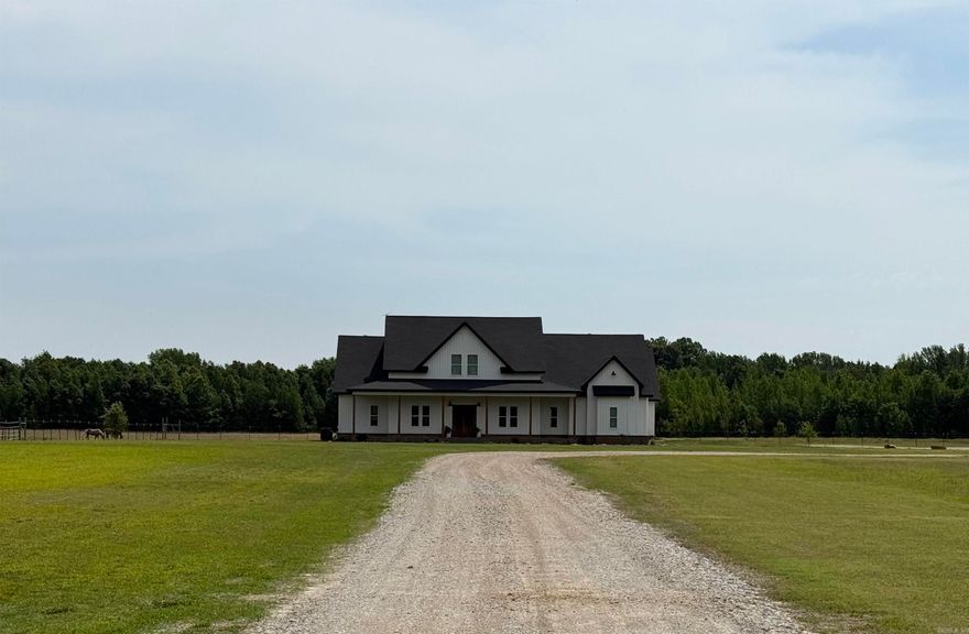 Country living and city amenities...this 4 bedroom 4 bath home has it all! Nestled on 32 acres on a dead end street, barn with 4-5 stalls, and much more! The house featured natural sealed concrete floors on the main level. The main level has 4 bedrooms and 3 full bathrooms. All bedrooms have large or walk-in style closets. The kitchen has tons of custom wood countertop space, and stainless appliances. There is an eat-in kitchen area, along with a formal dining room. The master suite is overlooking the pond/pasture. The master bathroom has a free standing soaker tub, walk-in tiled shower, dual vanities, and a HUGE walk-in closet. Upstairs is an extra large bonus or media room with an office area and full bathroom. The 30x60 barn currently has 4 stall areas (one is big enough for a divider), hay & feed storage area, and plenty of room to park tractors, mowers, & trailers. This property is truly one of a kind & a must see!