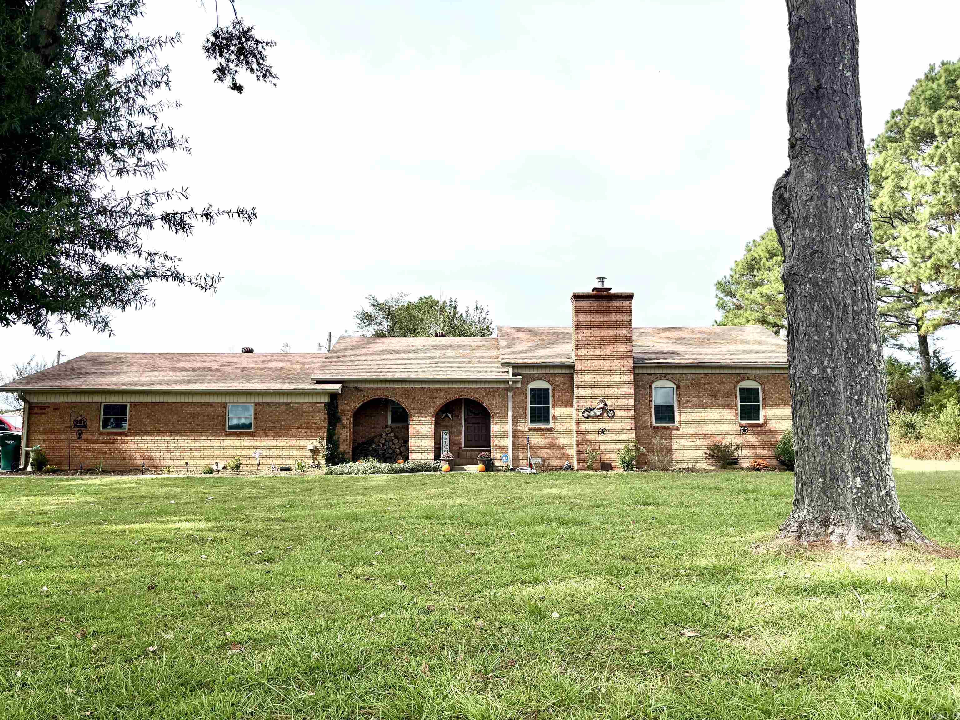 Charming all-brick home on 3 peaceful acres with mature shade trees, 30x40 shop with electric and a barn built with Cypress! Features 2 bedrooms, 2 full baths, and recent updates including HVAC, appliances, windows, septic service, leaf gutters, and granite countertops. Enjoy quiet country living with space to relax, work on projects, or grow your own garden!