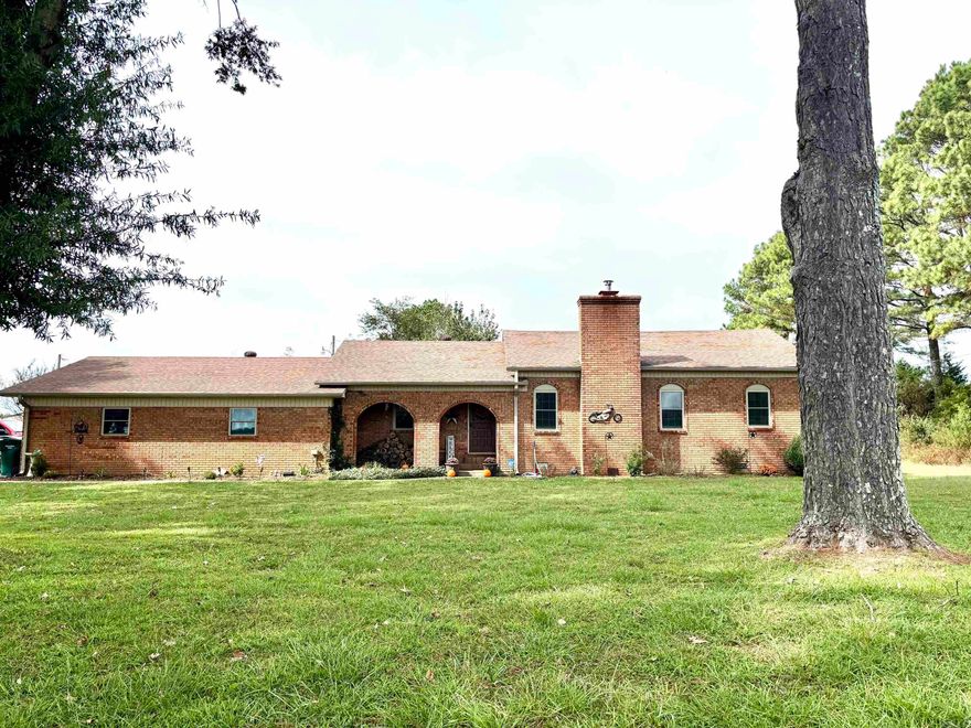 Charming all-brick home on 3 peaceful acres with mature shade trees, 30x40 shop with electric and a barn built with Cypress! Features 2 bedrooms, 2 full baths, and recent updates including HVAC, appliances, windows, septic service, leaf gutters, and granite countertops. Enjoy quiet country living with space to relax, work on projects, or grow your own garden!