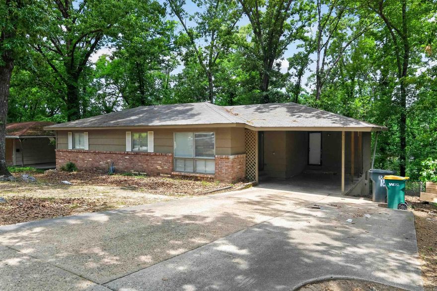 Welcome to this charming 1,522 sq. ft. ranch-style home in the established Meadowcliff community. Situated on an expansive 0.30-acre lot, this property offers rare space and privacy in the heart of Little Rock. The 2-bed, 1-bath layout features a classic 1950s footprint with an attached garage. Recent nearby sales highlight the area's incredible value for investors or first-time buyers. With flexible R-2 zoning and a deep backyard, the lot is a prime candidate for an accessory dwelling unit (ADU). Enjoy quiet residential living with quick access to Hindman Park and Pecan Lake.