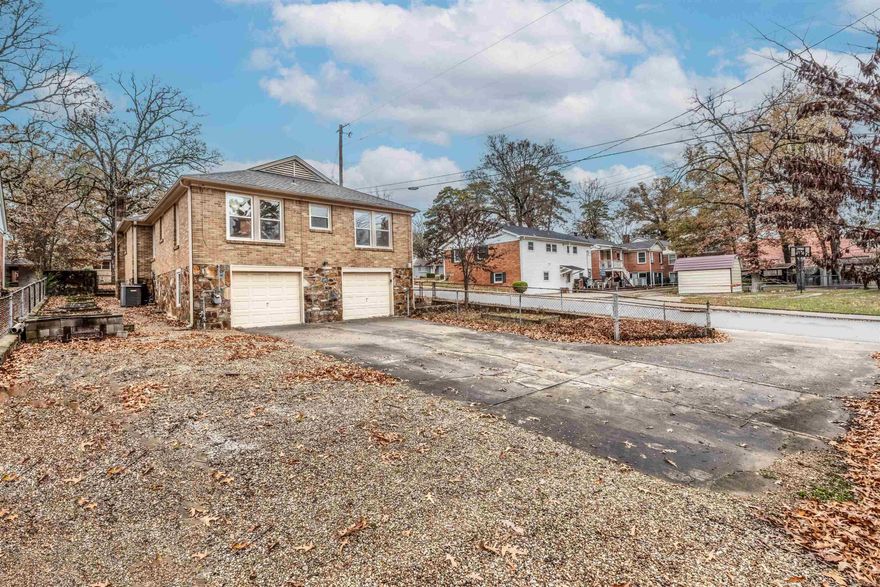 Experience the charm of this 3-bedroom, 2-bath home located in the Oak Forrest Community, part of the University District, where you will enjoy convenient access to local retail & restaurants. This home is move-in ready and features hardwood floors, a neutral color palette, & an abundance of natural light streaming through newer, insulated windows installed in 2016. The home offers ample storage with large closets, plenty of kitchen cabinets (including stylish glass fronts), & a huge floored attic. The updated kitchen features butcher block countertops and a new range/oven (2025); the refrigerator, large glass-top dining room table, foyer mirror/shelf, & rain barrel all convey with the property. Key updates include a new roof (2023), HVAC/furnace replaced (2017), a 2016 whole-house electric rewire with a 200amp service upgrade, & a vapor barrier added to the crawl space. New interior & exterior paint (fascia/soffit/window seals) were completed in 2025. Parking is a premium amenity for the area, offering an attached two-car garage with automatic openers and an expansive parking pad adequate for approximately 4-5 additional vehicles. This well-maintained gem awaits its new owner!