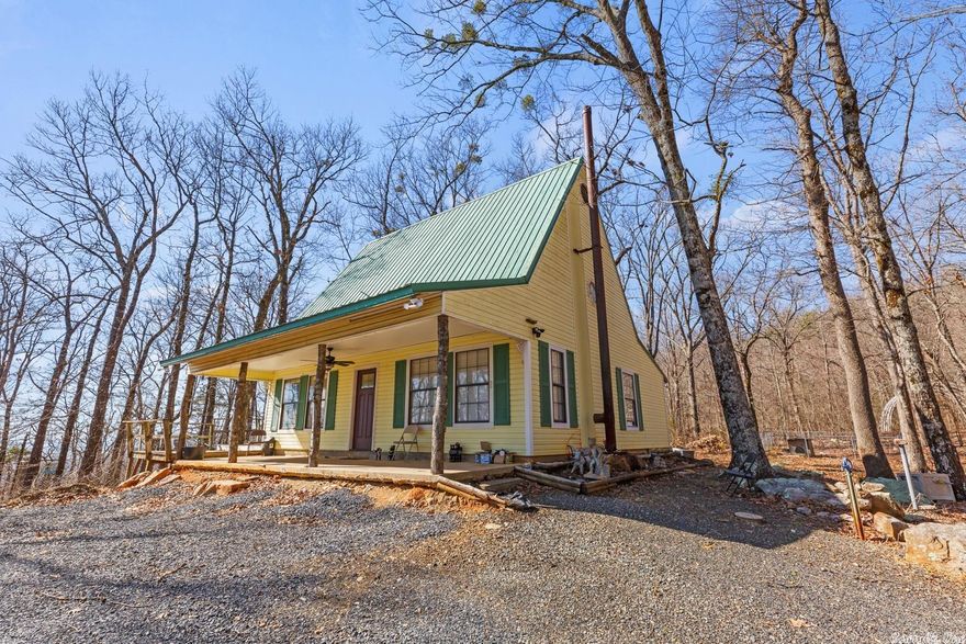 Mountain cabin with outstanding views of Polk County in Arkansas.  Sitting on almost 20 acres of wooded land, this property is the perfect retreat getaway.  Located at the end of a private lane you will find the recently remodeled cabin with loft.  The kitchen is brand new as is the bathroom and the fixtures.  The cabin is a two bedroom one bath with large front porch, laundry room separate dining area and more.  The property has a deck and a new balcony deck overlooking the valley below.  This is a rare opportunity to get a mountain property in Arkansas.  This property has well, septic, electric and good cell phone coverage.  High speed internet available via satellite or Starlink and this would make a great candidate for solar and going off grid.