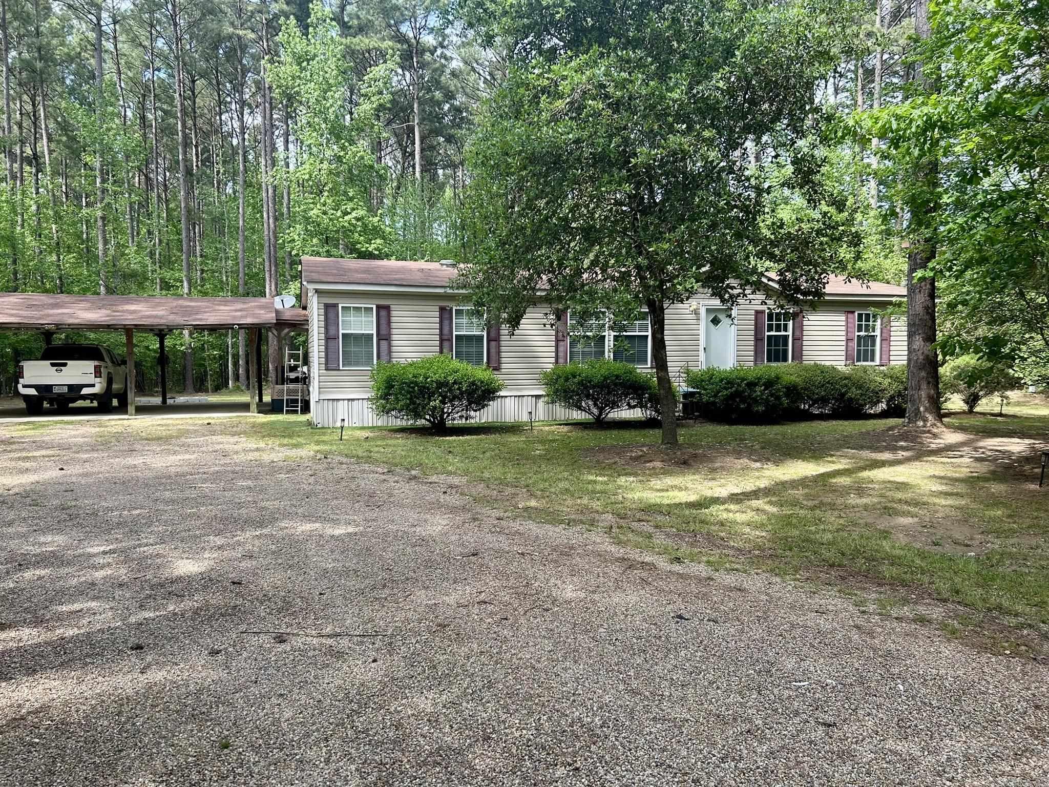 Looking for peace, privacy, and a move-in-ready home? This beautifully maintained 3 bedroom, 2 bathroom mobile home sits on just over 3 acresĀ of quiet countrysideāperfect for those who want space to roam without sacrificing convenience. - Well-kept and move-in ready - Qualifies for government loans (FHA, VA, USDA) - Spacious layout with open living and dining areas - Private and peaceful settingĀ ā ideal for enjoying nature or starting a small homestead - Room for animals, gardens, or additional buildings - Easy access to local amenities, yet tucked away from the hustle and bustle. Whether you're a first-time buyer, downsizing, or just looking for a little land to call your own, this property is ready for you to make it home.
