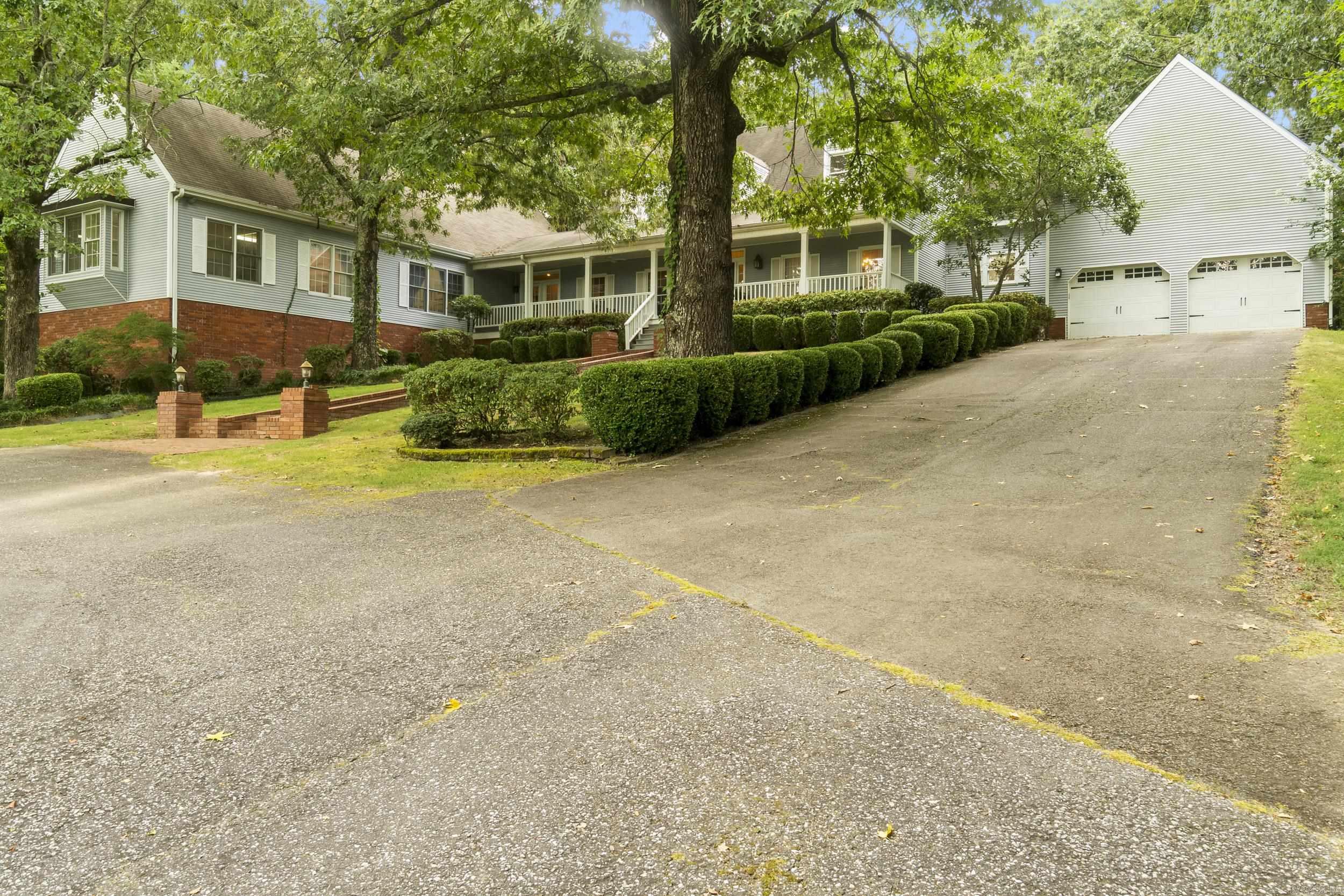 A private setting located on the West side of Searcy. A beautiful traditional home that sits on approx 2 acres offering a country setting. If you enjoy entertaining you have an abundance of space with 4904 sq ft. The Kitchen has a large breakfast bar and a separate eating area and dining room. The den offers a welcoming are for family and friends to enjoy with fireplace. There are 2 master suites providing ample room for a growing family. There are 2 rooms off of the primary suite that would allow for a exercise room, office or nursery. This home is a rare find. Dont miss out on this opportunity to enjoy this unique find.