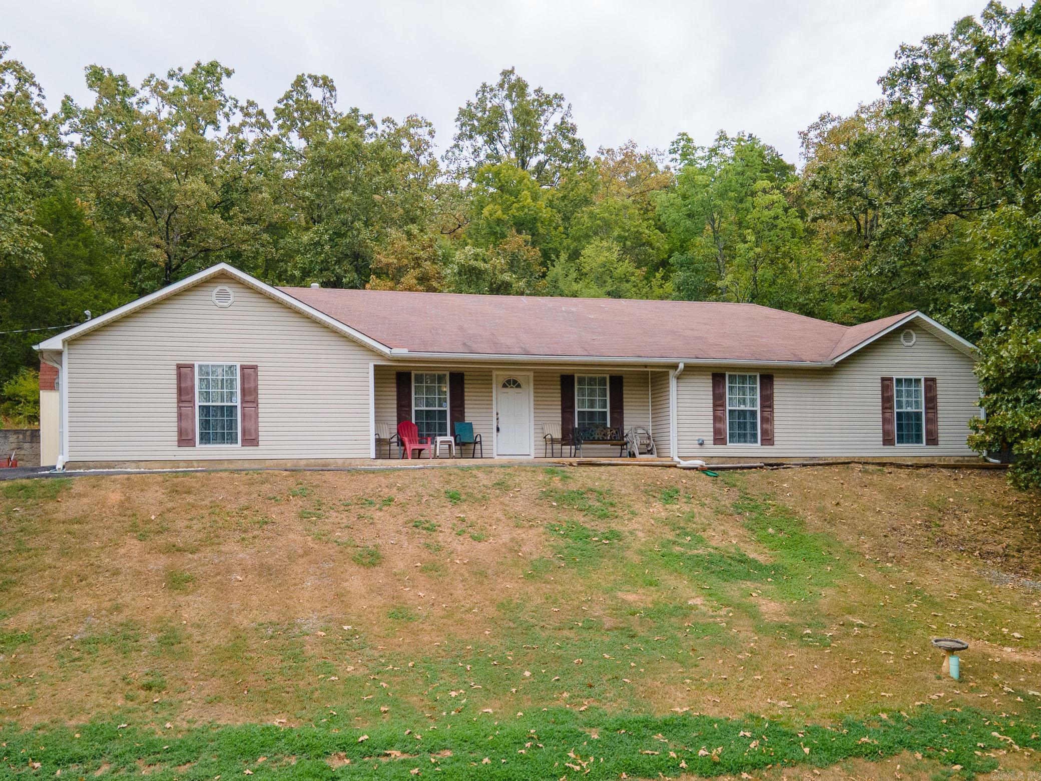 new heat and air 2019, new chain drive heat unit and 2 springs on garage door 2020 new hot water heater 2023, septic tank emptied 2024, new gas plumbing 2024, new line from house to septic tank 2024, new garbage disposal 2024, new carpet 2024, items conveying, bench on front porch, ramps in workshop , grill on patio , washer, dryer set , range, building dimensions: metal building 10 x 13, workshop by house 10 x 20 , new roof being installed on house and on the 10 x 20 workshop and two downspouts on the house .