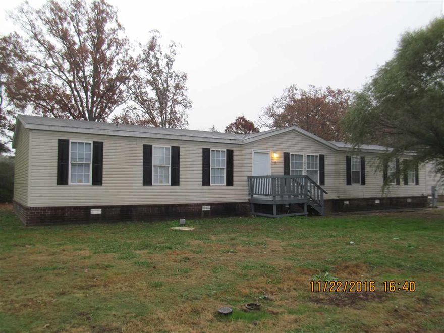 Oversized doublewide home on a foundation, 4 large bedrooms, sitting area or office area off master bedroom, 2 spacious living areas, freshly painted and new flooring throughout, large kitchen with dishwasher & range/oven, pantry off laundry room, large backyard, ready to move in!