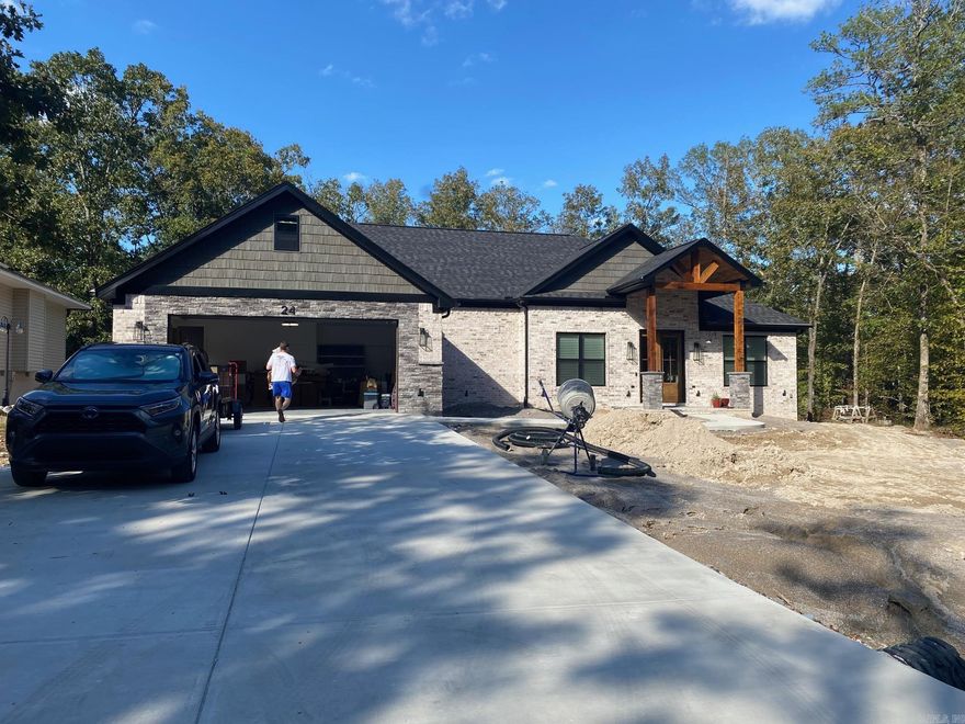 Another beautiful custom home by McMillan Construction, Inc. on buyer's lot. Tax for vacant lot only.