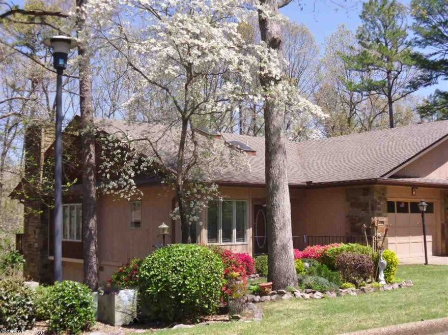 This may be the best duplex-for the best sq.ft. price-in the best shape-on the HSV market! Enjoy walks in private Vila Allegre while living a short walk from swimming, golf and dining.This move in ready, 1895 sq.ft. condo's main lvl. features textured walls/ceilings, lots of glass, skylights, cozy stone FP, laminate floors & tile kitchen(newer appl.) & bay window. It has fresh new colors inside and out-PLUS a hard to find car+cart GARAGE(+shop area). Lower level could function as guest suite OR 2BR/BA down.