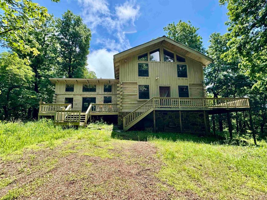 Wow is all I can think of with this beauty. If you want a true piece of Arkansas's majestic forests, then this is the place for you. Eighty-six acres of private natural beauty. Hiking trails thru out. Seasonal waterfall and creek. It even has a natural spring on the property line. The cabin is two Bedroom, two bath.  Master bedroom and bath is on the main floor with 360-degree views. And it has its own deck to enjoy the wildlife. Open floor plan on the main floor with a wood burning fireplace. The Ozark Mountain views off the side deck are amazing.  The upstairs loft area has a second bedroom and other room that could be a third bedroom.  This gorgeous place would make a great vacation get away or even a full-time home. The location is perfect 5 miles from the White River. Just a short scenic drive to Melbourne or Mountain View. I can't say enough about this beautiful place. It's a must see