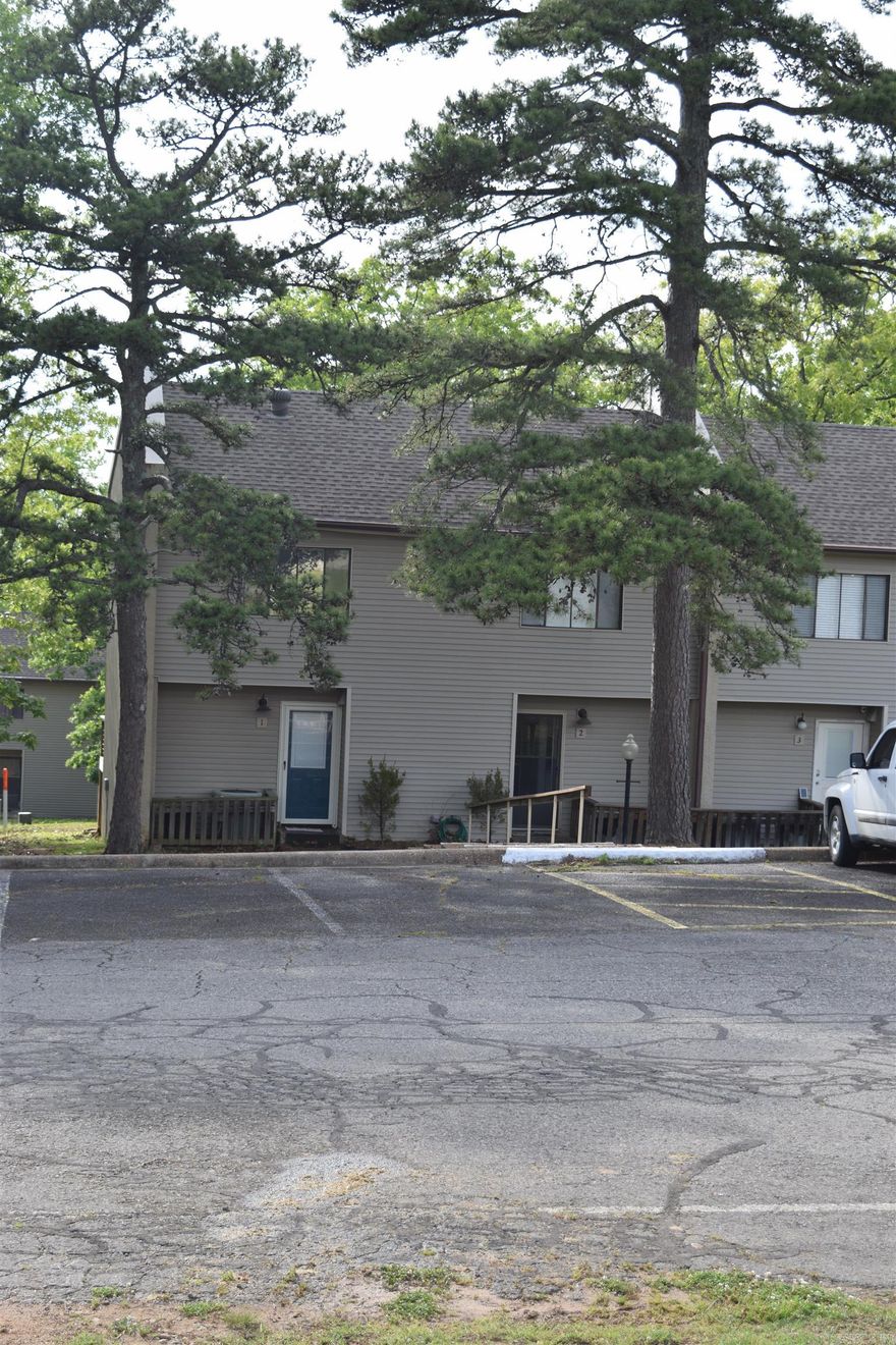 FABULOUS REMODEL on 2BR, 1.5 Ba condo just a stroll to the Cool Pool & Tennis/Pickle Ball Center!  The furnishings & decor items are beautiful, with everything included.  Updated kitchen with appliances included.  Updated bathrooms.  Washer/dryer too!  Sleeps 6.  Newer Rheem heatpump.  Rear deck provides outside seating and dining with a winter view of mountains.  Start living the resort life & enjoy all of the Fairfield Bay Resort amenities.  Just a few steps from parking to front door entry!!!  Condo fee includes cable & internet!!!  This would be a very nice lake getaway for you, and also could be used as a popular short-term rental.  It's turnkey and ready to go!