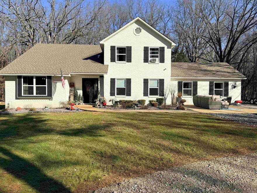 Welcome to your own slice of paradise! Nestled on 7.2 scenic acres, this stunning 4-bedroom, 2.5-bath home offers the perfect blend of privacy, space, and functionality. From the moment you enter the beautiful, tree-lined driveway, you'll be captivated by the peaceful setting and inviting presence of this property. Inside, the home features a spacious and thoughtfully designed layout ideal for both everyday living and entertaining. With four generously sized bedrooms and 2.5 baths, there's room for everyone to spread out comfortably. Outside, the possibilities truly shine. A large shop area provides incredible space for hobbies, storage, equipment, or a home-based business. The RV hookup adds even more convenience for guests or travel enthusiasts. With 7.2 acres of open space, you'll have endless opportunities whether you envision a mini farm, recreational retreat, or simply room to roam and enjoy nature. This property offers the tranquility of country living while still providing the amenities you need. Don't miss your chance to own this versatile and picturesque estate.