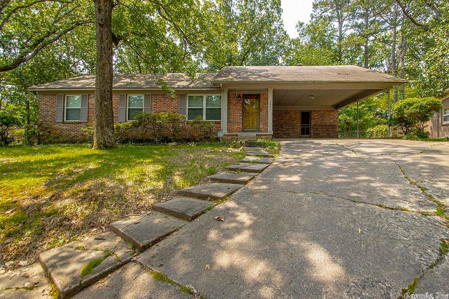 Super cute 3 bedroom 2 bath, brick house in a nice, quiet neighborhood.  Wood floors, updated kitchen.  2 car car port.  great fenced  back yard with nice entertainment area.  Well maintained and ready for a new owner.  Take a look today!