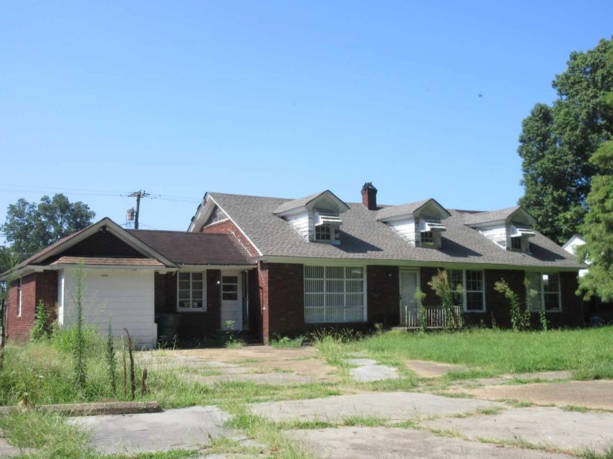 Perfect Investment Opportunity with Immediate Cash Flow!  Ideally located in the heart of Blytheville, this expansive brick home offers over 2,200 sq. ft. of living space and is already a proven performer. Currently generating $1,000 per month in rental income, this property is a "turn-key" addition to any investment portfolio.  The interior features a versatile and functional floor plan, including both a formal living room and a spacious den, providing plenty of room for family gatherings or entertaining. The home sits on a level lot with a large front concrete pad for ample parking. Additional conveniences include a laundry room and a classic brick exterior.  Whether you are looking for a steady income producer or a large home with great bones to make your own, 1205 Walnut St is a must-see. Sold AS-IS.