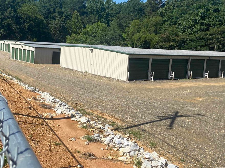 Extraordinary opportunity!  Keep It Here Storage encompasses approx. 15 acres with frontage on both Highway 270 and Highway 51 in Malvern. Here you will find 257 mini storage units, 12 open units, 2 well-kept homes and a shop. The property has been meticulously maintained and this has proven to be a very successful business staying at a minimum of 90% overall capacity. Fencing and a modern security system is in place. There is plenty of land for this business to continue to grow!  Call me for more info!!!