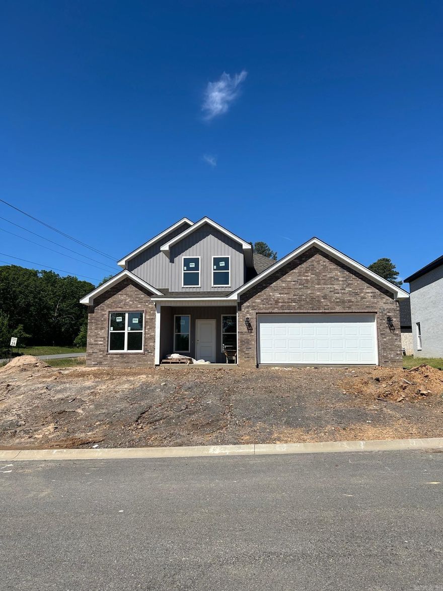 NEW CONSTRUCTION IN KNOTTING HILL – JACKSONVILLE Located near the Little Rock Air Force Base, this beautiful new build sits on a corner lot in the desirable Knotting Hill Subdivision.  This well-designed floor plan offers 4 bedrooms, 2.5 baths, and a 2-car garage. The open-concept kitchen, dining, and living areas provide excellent space for entertaining and everyday living.  The primary suite is on the main level and features a custom tile shower, soaking tub, and a spacious walk-in closet. Upstairs, you’ll find three additional bedrooms, all generously sized with great closet space.  Don’t miss your chance to own a brand-new home in a convenient location with thoughtful features throughout!