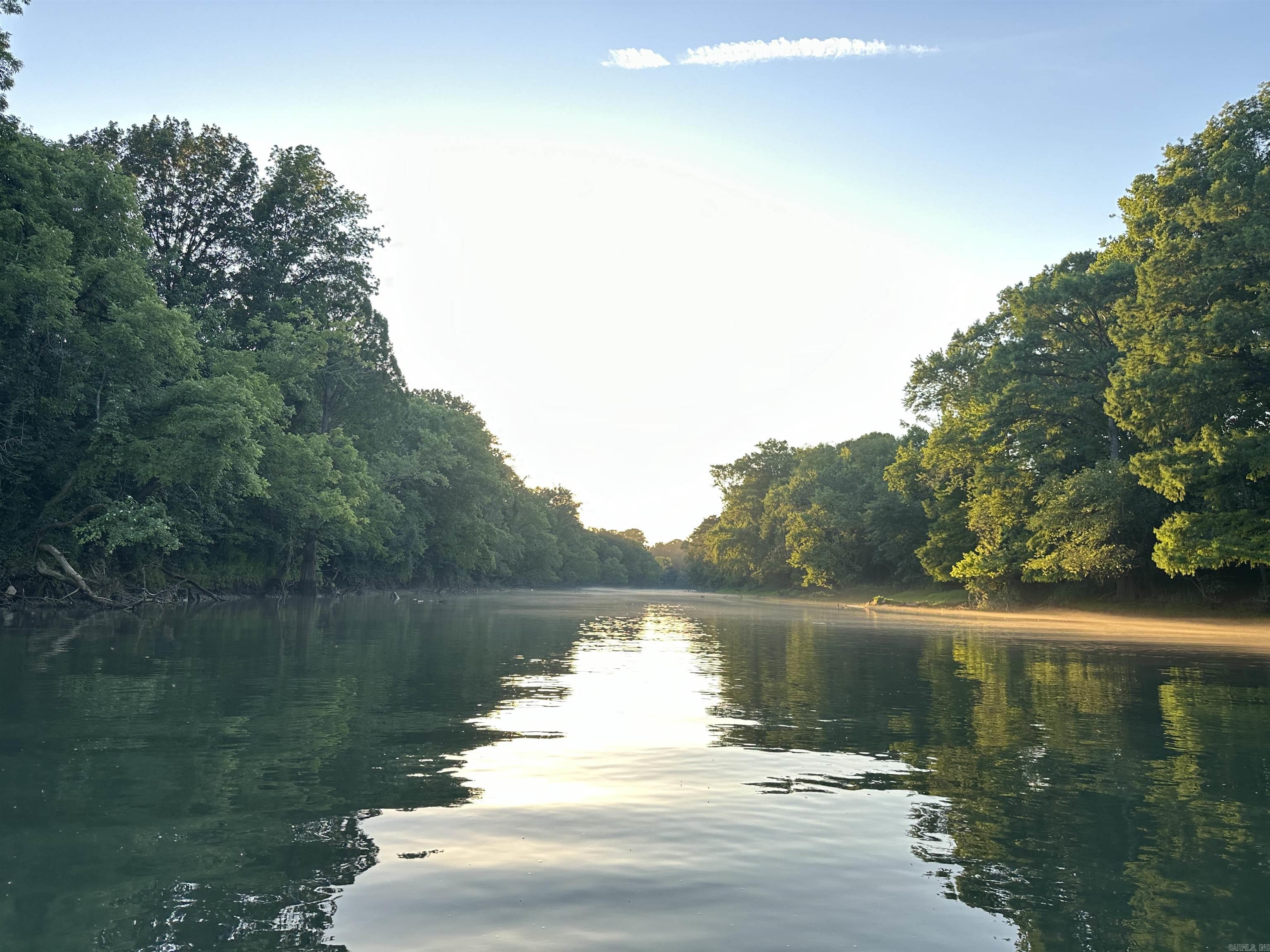 1.49 acres m/l of trout fishing on your riverfront property on the Little Red River just 3 miles from Pangburn. (Lot #1. See map.) World class trout fishing right outside your back door! This stretch of the Little Red River is known for both quality and quantity of trout. There are numerous rainbow trout and brown trout that call this stretch of the river home. You even have access to your own private boat launch! This property boasts access to your own private, gated boat launch. Located 3.2 miles upstream from the Ramsey's Access, and 2.6 miles downstream from the Dripping Springs Access. If you know, the Little Red River is home for many aquatic species, and also many other species unique to a tailwater ecosystem. It's not uncommon to see bald eagles, river otters, whitetail deer, turkey, and a multitude of migrating waterfowl. There are many resident Canada geese and wood ducks! It's truly a sportsman's paradise. This riverfront property is tucked away and protected by large, mature pine trees on the north side, and the Little Red River on the south side. For you lake lovers, you're 15 miles from the Dam Site boat launch on Greers Ferry Lake!