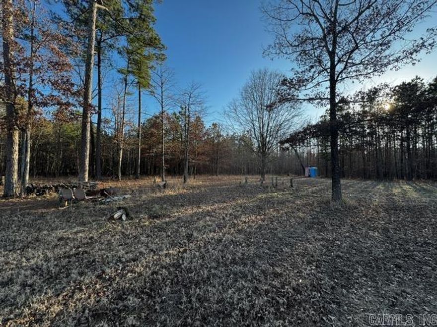 56.5 Acres ready for development or hunting just outside of Little Rock in Redfield, AR. Two gated entrances from Chaney RD. Water and Electric located at the corner of the property help make this one ready to build.   There is a camp/build site cleared and ready for a house or hunting camp.  Numerous roads and shooting lanes make it a turn-key hunting property.