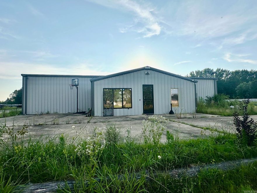 Reduced***This large warehouse offers excellent functionality with 4 overhead doors, an office area, and a partially finished 400 sq ft loft—perfect for added  storage. An additional 1,600 sq ft has been added to the original structure, providing even more room to grow your business or operations. Property is being sold as is, and some contents will be removed prior to closing. The owner was in the process of remodeling and was unable to finish. A great opportunity for investors, business owners, or anyone needing substantial space with convenient access. Contact today for details or to schedule a private showing! Sqft is approximate, please measure.