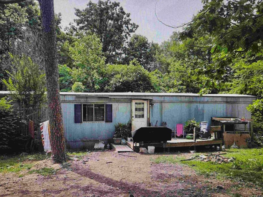 Motivated seller! Mobile home with 1.77 acres MOL located only a few minutes from Mountain View, White River, and the Ozark National Forest.