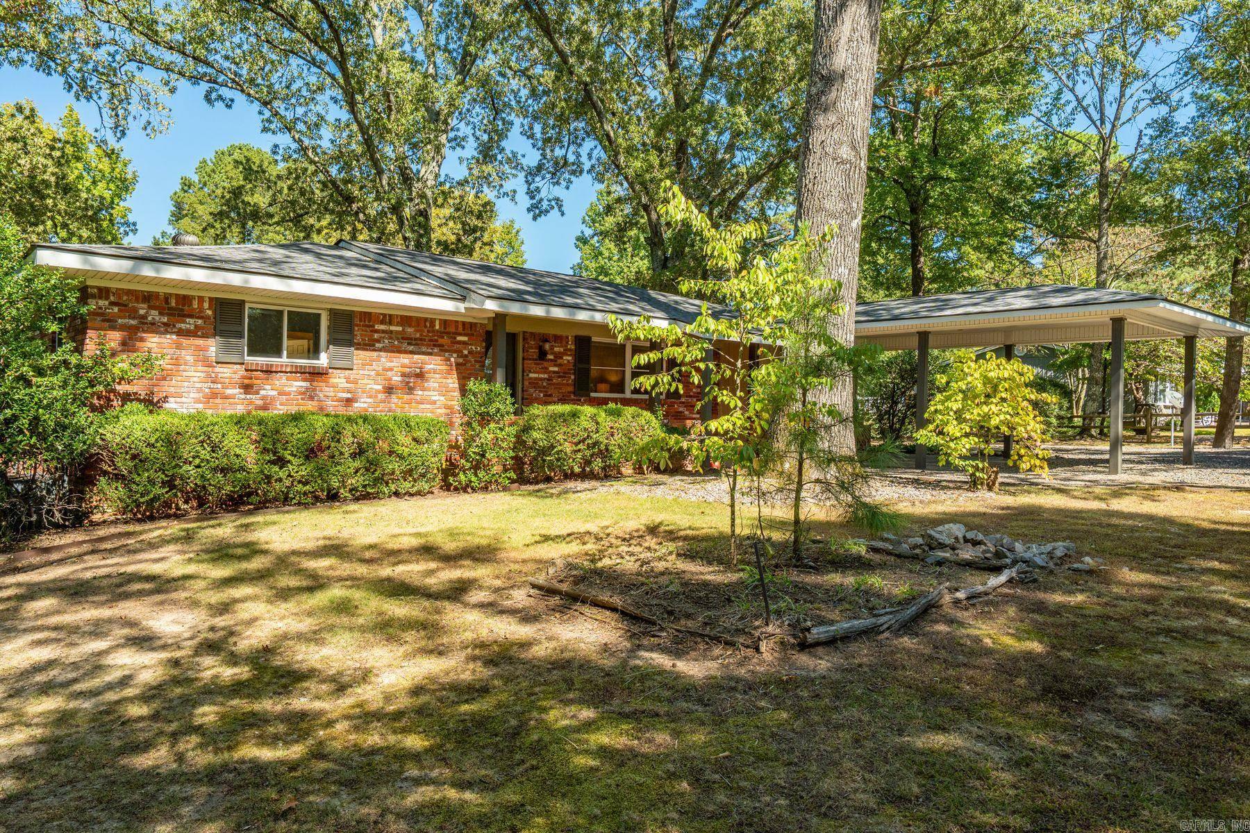 Tucked on a spacious, level lot surrounded by mature trees, this property offers the best of both worldsāa charming 1,490-sq-ft, 3-bedroom, 2-bath primary home PLUS a versatile 570-sq-ft cottage. The main home features fresh interior paint, new carpet in the bedrooms, and a bright, airy feel thatās easy to love. The separate cottage includes its own kitchen set-up, a full bath with a walk-in shower, and a flexible studio-style layout thatās ideal for guests, hobbies, or generating rental income.Ā Enjoy peaceful mornings on the deck overlooking the fenced backyard. Take advantage of two storage buildings to keep everything organized. With plenty of outdoor space, extra parking, and room to garden or play, this property offers a rare blend of comfort and opportunity.