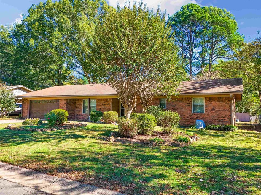 Three bed/two bath brick home with an office, two car garage, an enclosed sun room, storm shelter, nice yard, and storage building within a stone's throw of the UCA campus! Washer, dryer, and refrigerator all convey! Be sure to check out the 3D tour and aerial drone footage by clicking the links.