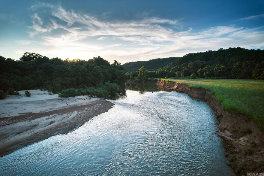 Strawberry River frontage!! Almost a mile of hard to come by river frontage on this 194.7+/- acres. This unique property has it all from several great building spots, fantastic views, a good river bottom field for hay or pasture, hunting land, and even a sandy beach. Property has availability to NAEC electric with NEXT high speed internet along with Grange/Calamine water.