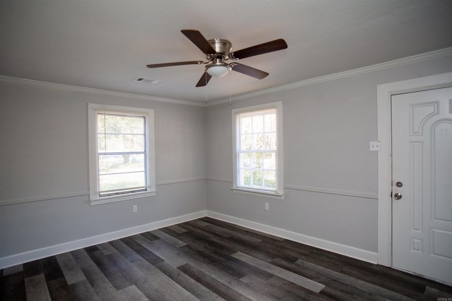 MOVE IN SPECIAL! HALF OFF FIRST MONTH'S RENT! Newly remodeled 3BR in Little Rock near UALR. New paint and flooring throughout. Large fully fenced backyard with plenty of shade. Perfect for anyone with kids or pets. The lease for this property is for 2 years with a 3% increase after the first year. Income has to be 3x the amount of rent unless you have a housing voucher.