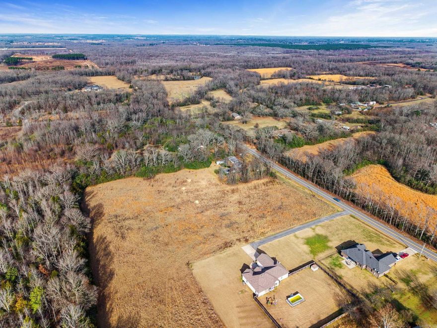 Enjoy the peace and privacy of country living on this beautiful 4.6 acre tract located just outside the city limits. With no restrictions and no HOA, you’ll have the freedom to build what you’ve been dreaming of. The land is cleared with natural tree lines for privacy and easy site placement. All utilities are currently at the road. A perc test has already been approved for a septic system, making this property truly build-ready. Convenient to nearby town amenities while offering the feel of true rural living, this property is a rare find with space, flexibility, and opportunity. Come walk the property and see the possibilities for yourself.