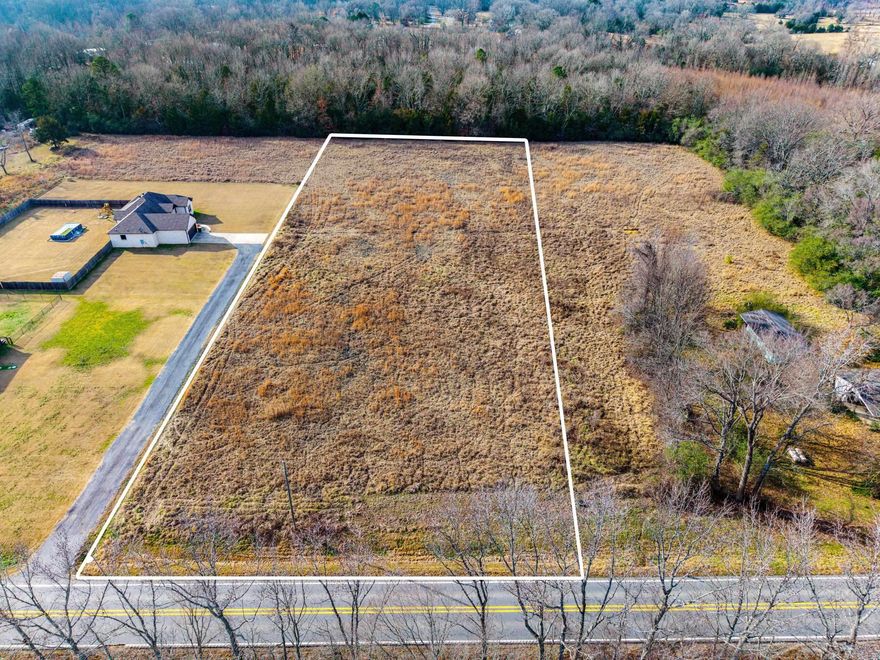 Enjoy the peace and privacy of country living on this beautiful 2-acre tract located just outside the city limits. With no restrictions and no HOA, you’ll have the freedom to build what you’ve been dreaming of. The land is cleared with natural tree lines for privacy and easy site placement. All utilities are currently at the road. A perc test has already been approved for a septic system, making this property truly build-ready. This tract is part of a larger 4.6 acre parcel that is also available if additional acreage is desired. Convenient to nearby town amenities while offering the feel of true rural living, this property is a rare find with space, flexibility, and opportunity. Come walk the property and see the possibilities for yourself.