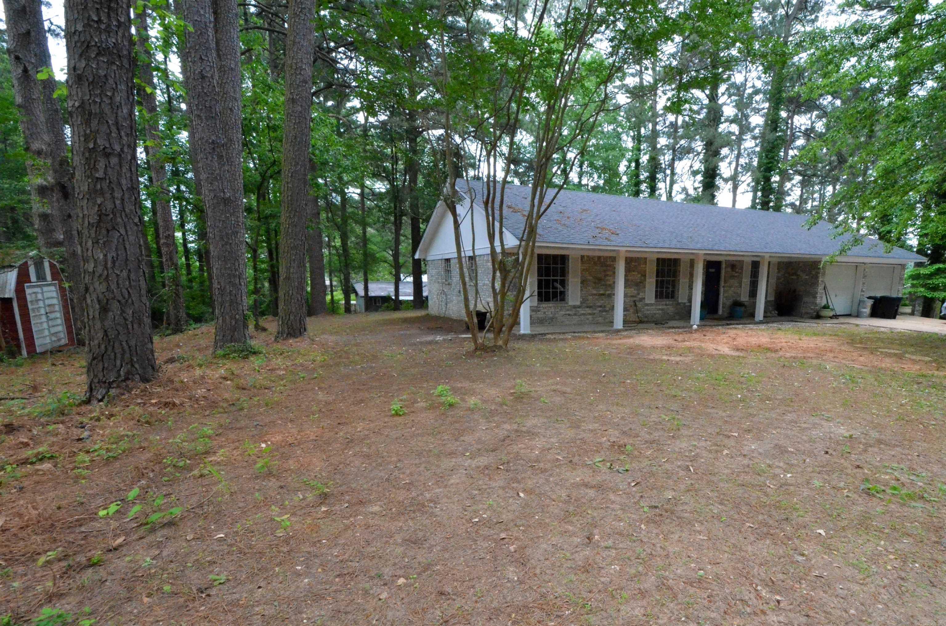 This inviting 3-bedroom, 2-bath home sits on a spacious, tree-shaded double lot right in the middle of townāoffering quick and easy access to schools, local shops, and everything you need. Fresh exterior paint and a brand-new roof (2024) offer great peace of mind. Inside, you'll find a great floor plan with all-new flooring throughout, an updated kitchen, and two separate living areas. The deckāperfect for morning coffee, or listening to the rain. Fiber high-speed internet is available, and itās just a short drive to Little Rock! Act fastāhomes like this donāt come around often!