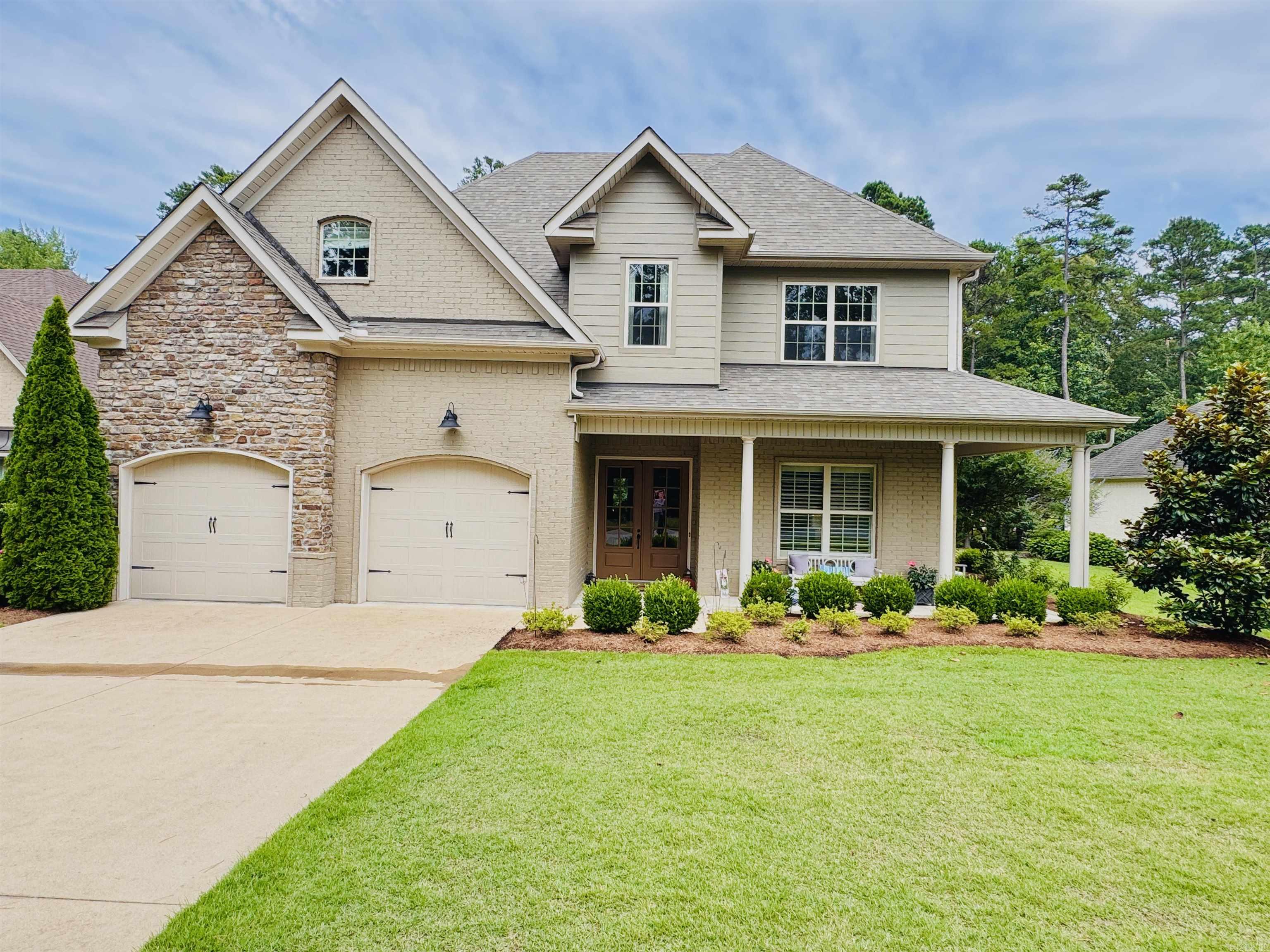 Nestled in the highly desirable Miramar Place within Chenal Valley, this stunning custom-built Traditional French Country home offers a luxurious and spacious living experience with an open floor plan, perfect for entertaining. With 5 bedrooms, 4 full bathrooms, and an exceptional layout, this home is designed to meet all your family’s needs while maintaining an inviting atmosphere for guests. Open Floor Plan for Entertaining, that flows into an oversized screened patio with hot tub and a fire pit. Extra large master suite is a true retreat. Massive master bath boasts dual vanities, soaking tub and walk-in shower. Split floor plan with in-law quarters, for privacy for family or guests. Chef's Kitchen with custom stain cabinetry and top-of-the-line appliances. Also offers an eat-in area and large formal dining room with custom-made shelves. Head upstairs to find 3 bedrooms and 2 full baths. 3rd bedroom can serve as a versatile flexroom/home office. Spacious 2 car garage, comes with Tesla charging station, room for golf cart and space for fridge and additional storage. It’s the perfect location for those seeking luxury, convenience, and serenity.