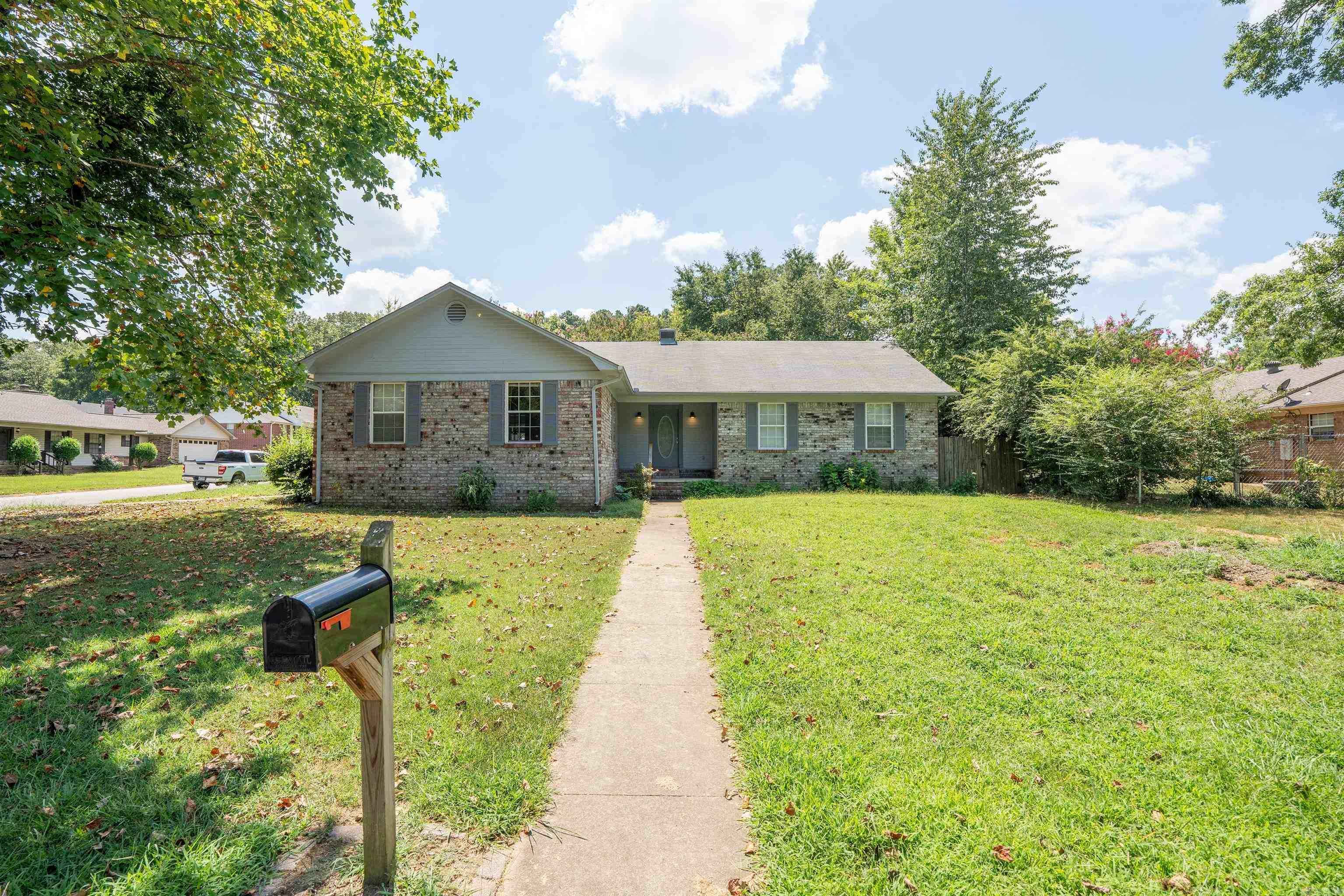 Just Listed! Move-in Ready Corner Lot Home. This beautifully updated 3-bedroom, 2-bath home is move-in ready and perfectly situated on a spacious corner lot. Step inside to find a bright, open-concept layout featuring a large living area w/vaulted ceilings, painted beams, & cozy wood-burning fireplace. The kitchen is a showstopperācomplete with gorgeous granite countertops, modern cabinetry, stainless steel appliances, and a granite-topped island with a breakfast bar. There's also plenty of space for a full dining table near large windows that flood the area with natural light. Conveniently located off the two-car garage is a generous laundry room with built-in cabinetry for extra storage. There's a coat closet right off the front entry. All bedrooms are carpeted for comfort & located together. Throughout the home, you'll find updated modern light fixtures, brand new luxury vinyl flooring, fresh interior paint. Outside, enjoy a private, wood-fenced backyard with a patioāperfect for relaxing or entertaining. A newly added wheelchair ramp (with steps) off the back door adds accessibility. With plenty of windows and thoughtful updates throughout, this home combines comfort, style,