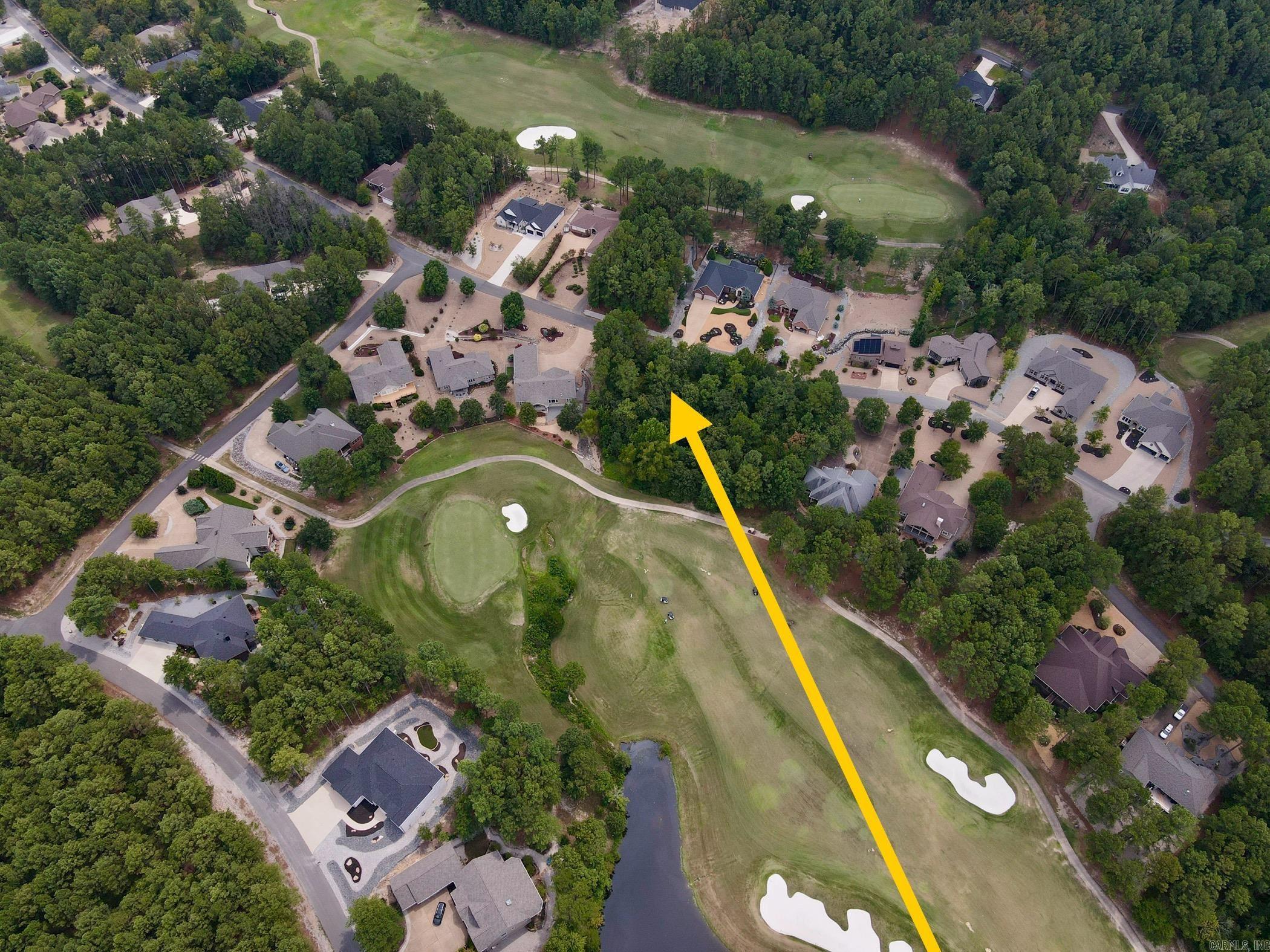 Granada Golf Course lot with gentle slope. Located near green of Hole #15. Come build your new golf front home in Hot Springs Village! It is home to 11recreational lakes, nine championship golf courses, 13 tennis courts, 14 pickleball courts, 30 miles of walking trails, more than 200 clubs and organizationsand numerous additional activities for all ages. Spanning 26,000 acres of the Ouachita Mountains, Hot Springs Village is the largest gated community inNorth America. New Member Buy-in Fee due at closing.
