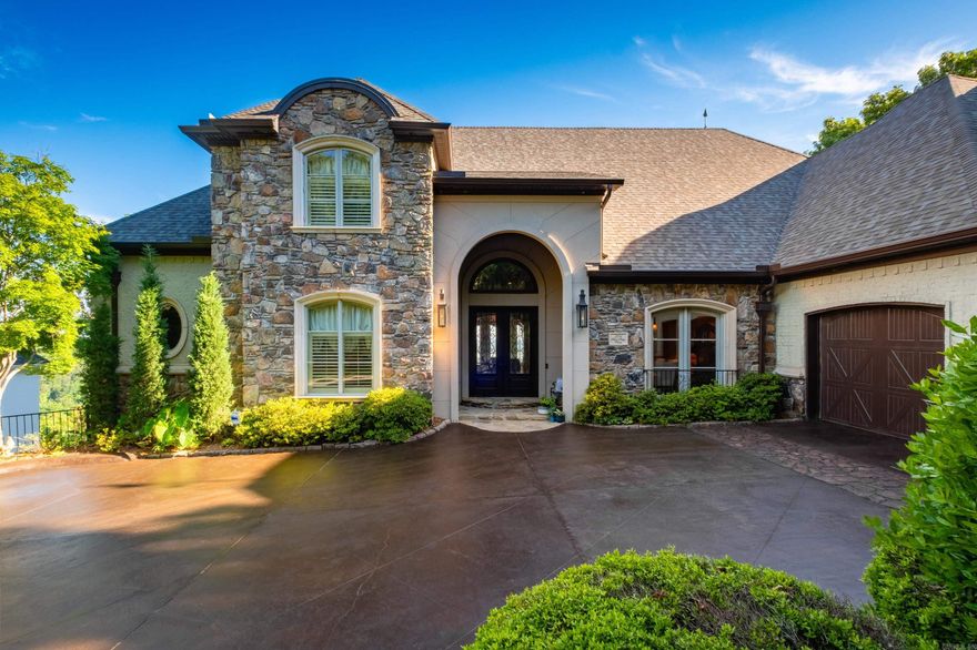 Breathtaking panoramic views of the Arkansas River highlight this custom-built home in the gated River Ridge Pointe community. This 3-story property offers 4 bedrooms, 3 full and 2 half baths, and over 5,800 SF. Main level lives like a single story with the primary suite, multiple living and dining areas, office/music room with built in bookcases, and soaring 22’ ceilings in the entry and living room. Kitchen features granite countertops, custom cabinetry, breakfast bar, and opens to a cozy den with fireplace, plus butler’s pantry and large laundry room. Primary suite includes fireplace, sitting area, heated floors, and spa-like bath. Upstairs offers 2 bedrooms connected by a shared en suite bathroom. Lower-level features exercise room, guest suite, bonus/media room, half bath, and covered patio access. Terraced, fenced backyard with river views and wooded privacy. Additional features include 4 fireplaces, built-ins throughout, whole house generator, new roof (2025), views from almost every room, oversized 4-car (2-door) garage, a 900 SF floored attic, and a 1,200 SF unfinished basement.