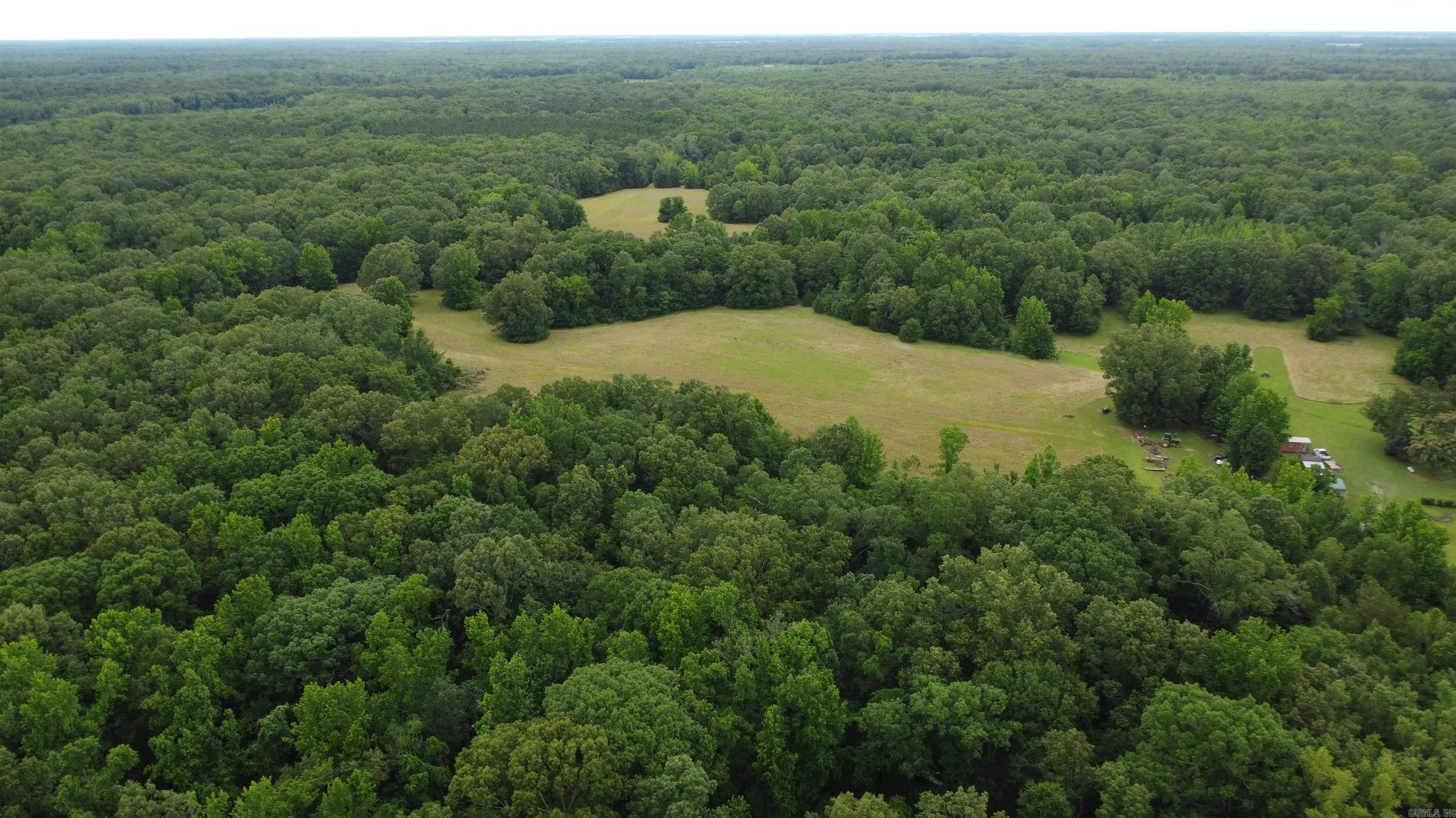 Lagrue Bayou Bottoms ā Premier Hardwood Hunting Tract with Large Food Plots Nestled in the heart of Arkansasās delta region and near the historic Lagrue Bayou, this exceptional tract offers the ultimate blend of mature bottomland hardwoods and well-managed wildlife habitat. While the bayou lies just nearby, the property itself is a true showcase of native timber and strategically placed food plotsāmaking it a turnkey setup for the serious hunter. Towering oaks, hickories, and other mature hardwood species dominate the landscape, creating incredible bedding and browse habitat for whitetails, along with roosting and strutting areas for wild turkeys. The large, open food plots are a standout featureāperfectly positioned and maintained to attract and hold wildlife throughout the year.