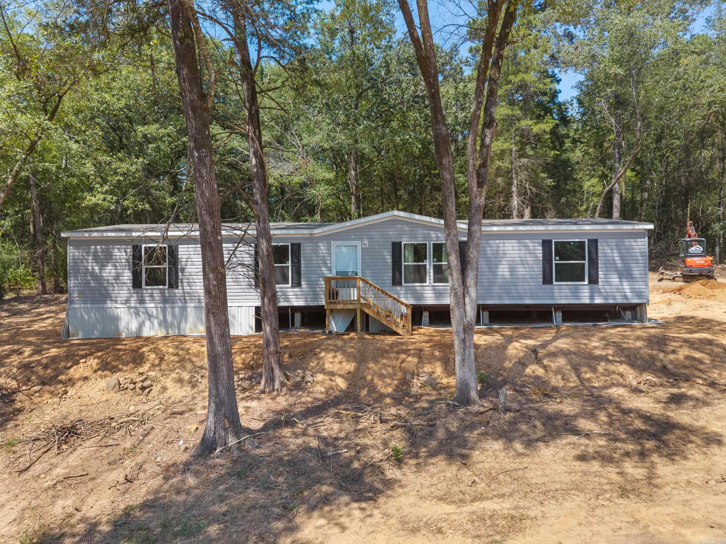 Brand New Champion Manufactured home installed on approximately 2 Acres in between Perryville and Lake Nimrod, Arkansas called Lot 1. Approximately 15 minutes from the Lake! and 12 minutes from Town! Beautiful Country Setting in Arkansas with a 4 Bedroom 2 Bath home set on a permanent foundation, FHA & RD Loan Eligibility. Utility Services will include: New City Water Line, New Septic System, High Speed Internet or Fiber Internet & good cell coverage. Ask your Agent about $0 Down Payment Loan options with approved credit!
