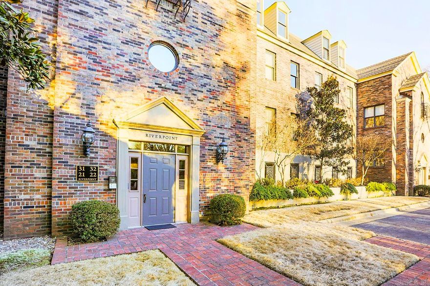 Beautifully updated one-level condo with lovely details and finishes throughout open floor plan. Floor to ceiling windows offer views of bluffs, river and city skyline. 10' ceilings, HW floors, large laundry, spacious kitchen with top of the line appliances. Primary bedroom has luxury bath and custom walk in closet. There are 2 additional bedrooms, hall bath and large covered patio. Elevator service from 2 reserved garage parking spaces, storage room and private mail box.