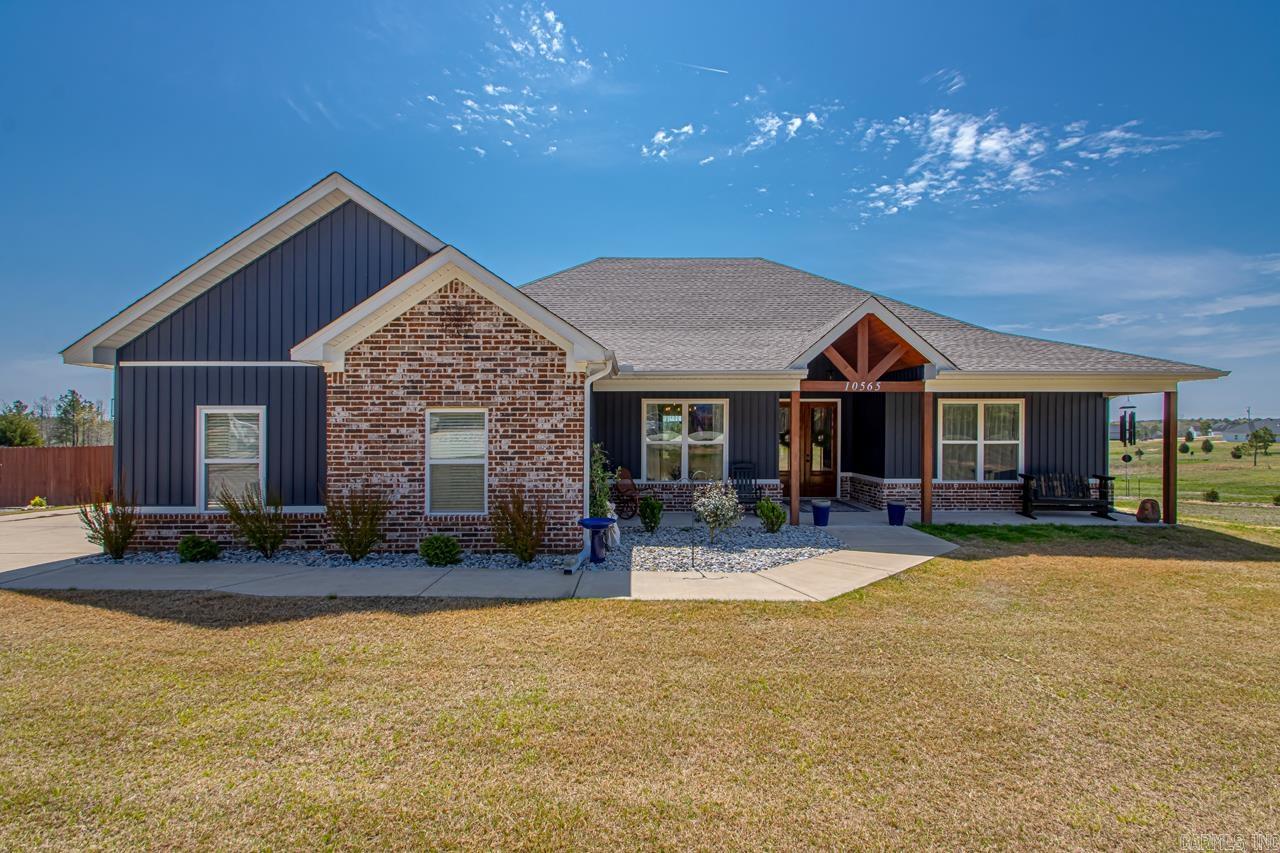 WELCOME HOME! This like new home has ALL the BELLS & WHiSTLES! This home, built in 2022 welcomes you with an open concept, perfect for entertaining 2 to 22 or just hanging out with family. Custom built ins throughout this beauty. Split floorpan, primary suite is exactly that, and the closet adjoins the laundry room equipped with a sink and ample amount of space! Step outside, and soak in the view and relax in the newly built salt water pool! Extra landscaping all around and no MULCH! Beautiful rock in the flowerbeds and new grilling area added as well as Covered area poolside. The oversized insulated garage/shop, (20x36) is perfect for all the toys and extras! The Might Safe Storm Shelter gives peace of mind during weather! The circle driveway and extra parking pad makes entertain a breeze! NEW Privacy around yard but you still get to enjoy seeing the wildlife to the end of backyard! You do not want to miss out on this one! Move in ready with everything you would want to add already done for you!! Agent remarks