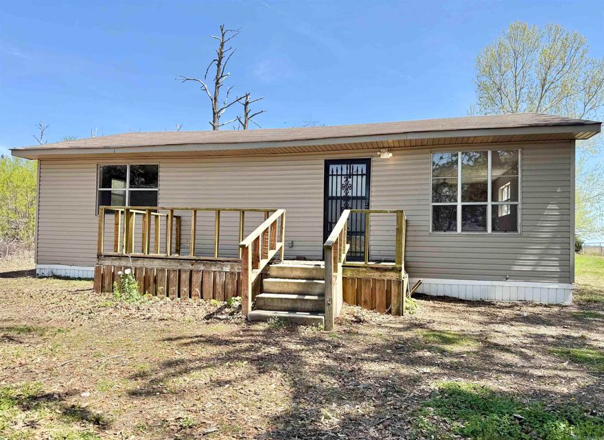 Whether you're looking for a peaceful getaway, an investment property, or your first home, this one delivers affordablity without sacrificing comfort. Located in a quiet setting with room to roam, it's easy to imagine relaxing on the deck, enjoying the fresh air, and watching the crops grow around you!   Welcome to 1184 Hwy 75 located south of Parkin, Arkansas in Cross County! This 2 bedroom, 1 bath home is located south of Parkin, Arkansas and sits on around half of an acre. The interior of the home has recently been painted and all flooring has been replaced. Central heat and air keep the home regulated. A front porch deck allows you a peaceful place to hang out with your family! This house would also be a great fit for someone working on a local farm operation or a small hunting camp!