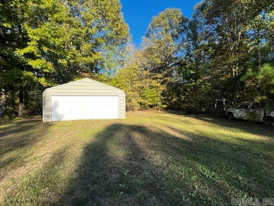Pretty land on the end of a cul-de-sac, ready for you to build your dream home or place a mobile home.  There is an older mobile home on the property that conveys at zero value and is not livable.  This 3.05 acres already has septic, water, power on the property.  There is also a 20x20 shop on the premises that will convey.  SEE AGENT REMARKS