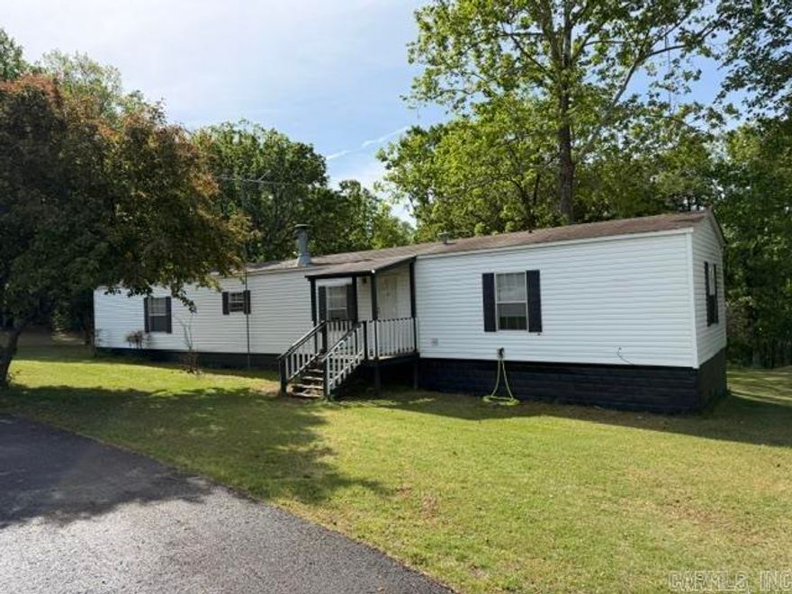 Well maintained mobile home on 2.50 acres right outside heber Springs.  Three bedroom and 2 bath with covered back porch and carport cover.