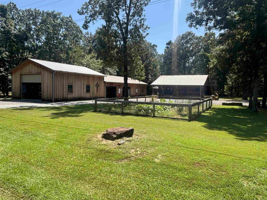 Are you looking for a Lake Property with it all?  Well you just found it!  Enjoy your beautiful cabin home with 2bdrm down & a loft w/3rd bdrm 2 full baths on main floor! Wonderful master suite w/ large masterbath huge shower 2 shower heads! Exit your mastersuite out to back patio and relax in you private hot tub! Visit family & friends on your big front porch!  But there's more! Just a few steps away awaits your 30x90 shop offering 30x40 13&1/2 ft tall w/ garage door for parking RV, party barge, vehicle of your choice! Also offering a 30x35 10ft tall area w/2 garage doors! This area is currently used as party area/ game room with gas heat for winter time! Could also be used for extra parking garage!  Within this building you'll also love the 30x25 10ft tall guest h/c apartment w/full klitchen & full bath! Let your guest stay over or use as mother in law suite or arbnb. Unit has it's own septic tank! Very nice storage building out back stays as well!  There are so many options with this property!  Lots of fun & enjoyment awaits! Seasonal Lake View! Come check it out!