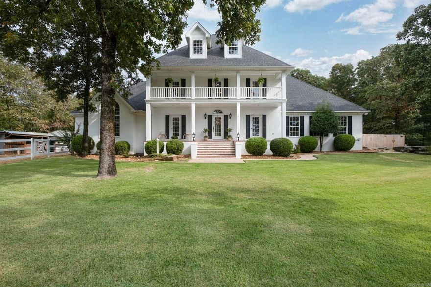 Beautiful 3 story home on 3 acres +/-. Top floor is a game room. There is not enough room to write all the details and qualities , so come take a look for yourself. This home has been completely updated inside and out. Fenced for horses with a white board fence with a small barn. Front yard is Zoysia with sprinkler system. Backyard is beautiful with an outside dining and living area with a fireplace and custom cook out area with grill/vent-a-hood, fridge, sink, etc. AND THEN THE POOL with a slide, and hot tub all with outdoor tv to watch while you are relaxing, and then don't forget to step into the dry sauna. You can also watch TV there . There is outside surround speakers bathroom with shower. Kitchen and master bathroom has been updated. Nice laundry room and storm shelter.3 bedrooms upstairs Plus an office that could be a 5th bedroom. NO carpet in the entire house! Surveillance cameras inside and out. Call today to view this lovely home.