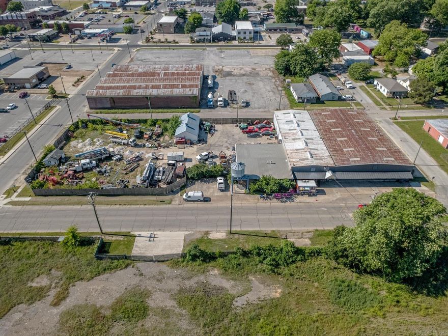 Welcome to Market 301 Burke St in Jonesboro, AR within an established industrial/commercial corridor near downtown. Situated on 1.18 +/- acres spanning 9 city lots, this property holds 16,664 sf of office/warehouse space offering flexibility for contractor, fabrication, distribution, storage, service, and business operations. The metal building is accented by multiple office spaces, conference/work areas, mezzanine storage, warehouse sections, roll-up/loading access, fenced outdoor storage areas, and paved parking/work space. The property is serviced by city water, sewer, electricity, and natural gas and is zoned C-1. The combination of office space, warehouse functionality, outdoor work/storage areas, and central location creates opportunity for owner-users, expanding businesses, investors, or operational headquarters. Surrounded by established commercial, rail corridor, service, warehouse, and downtown business activity, the property offers strong accessibility within the Jonesboro market. Rare opportunity to acquire a property w/ scale, infrastructure, flexibility, and operational potential. Call today to make an investment in tomorrow.
