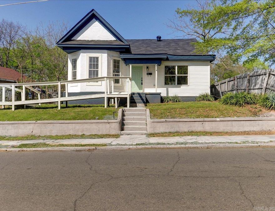 Wow! Check out this stunning 3-bedroom, 2-bath home in town that has been completely remodeled! Built in 1900, it boasts a solid structure with spacious rooms and walk-in closets. The charming turret room, which was once a parlor, is now a cozy bedroom with an en-suite bath.   Enjoy a brand-new kitchen featuring stainless steel appliances, a breakfast room, and laundry area. The newly updated bathroom serves two bedrooms with a walk-in shower.   Additional highlights include a handicapped ramp for easy access to the front door, a concrete driveway, a large fenced yard, and a storage building. Fresh paint inside and out complements the amazing wood floors! ?#StunningHome #HomeForSale #RemodeledHome #3Bedroom #2Bath #CharmingTurret #SpaciousRooms #Handicap Access