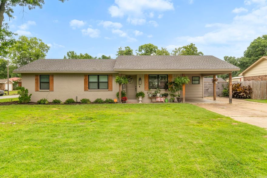 This beautifully updated 4-bedroom, 2-bath home was fully renovated in 2023 with a complete transformation inside and out. The home features luxury vinyl plank flooring, granite countertops, subway tile backsplash, and stainless steel appliances. The kitchen opens to a spacious second living area, ideal for entertaining or relaxing. The primary suite offers three closets plus a large walk-in closet, along with an en suite bath that includes a granite-topped vanity, updated fixtures, and a tub/shower combo. On the opposite side of the home, you'll find three additional bedrooms and a hall bathroom with double sinks, granite counters, and a convenient dual entry from the former master. This home has the space and layout you have been looking for! Call today for your private showing!