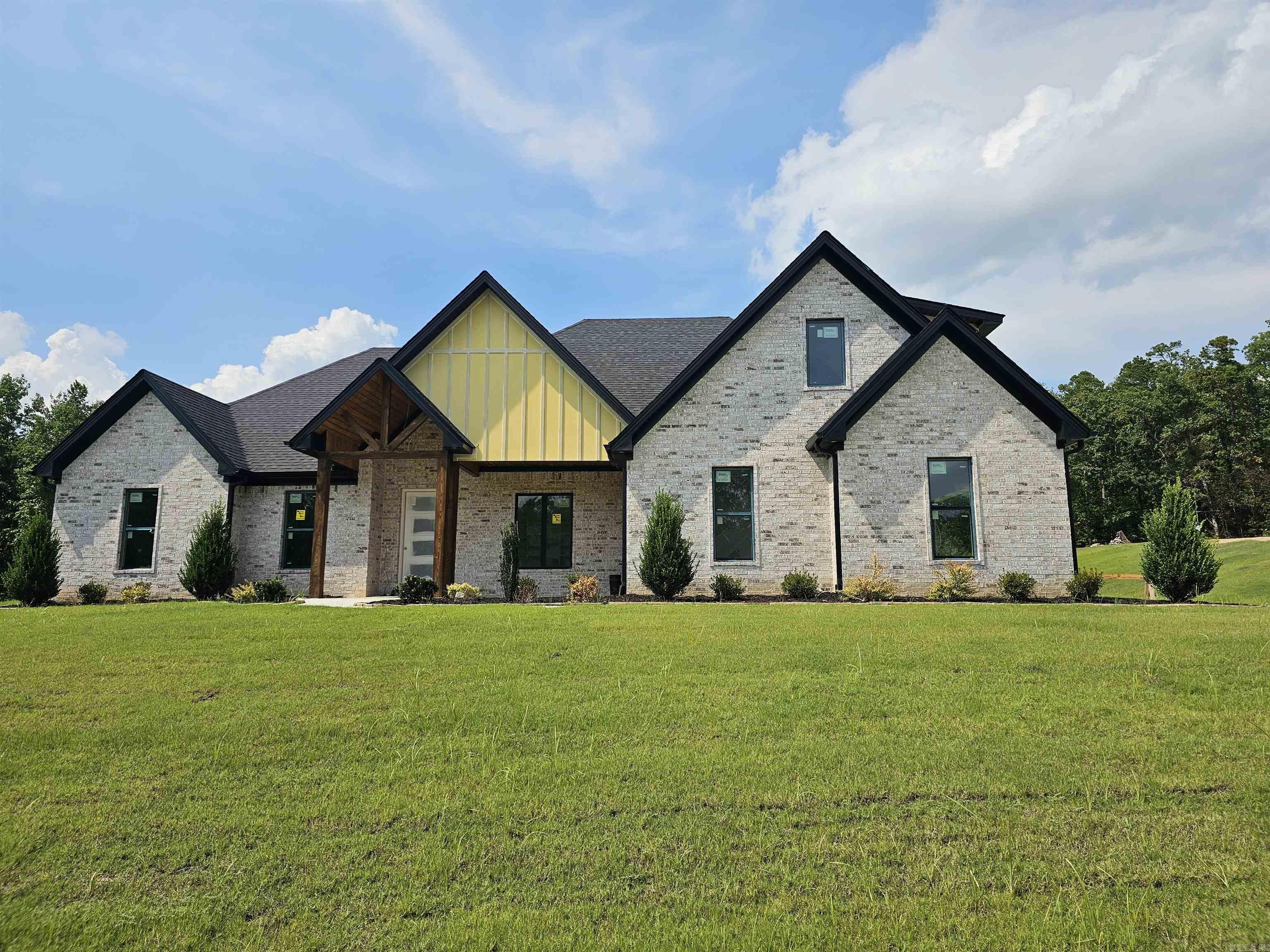 Sitting on 2.11 acres, this 2850 sqft, 4-bed, 3.5 bath home offers a well-planned layout with 3 beds & 2.5 baths downstairs, 1 bed & 1 bath upstairs, plus a spacious office for work or study. The gourmet kitchen features ample cabinet space and a walk-in pantry, perfect for storage and organization. The primary suite boasts a large walk-in closet and a spa-like bath for ultimate comfort. A 2-car garage provides convenience, while the gated community ensures privacy. 1 months until complete.