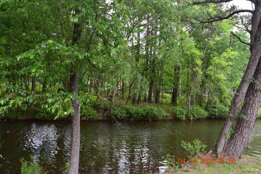 Five adjoining lots located off Big Duke Trail on Lake Hamilton, offering a rare opportunity for development or a custom homesite. This property features lake access and includes use of a boat launching ramp.  Utilities are available, making it ready for your building plans. Convenient location close to area amenities while enjoying Lake Hamilton living. Buyers to verify utilities, zoning, and building requirements.