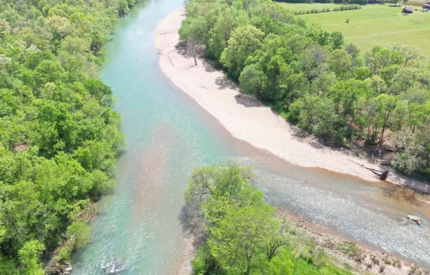 This WATERFRONT cabin is the perfect place if you are a lover of the great outdoors.  Fishing and swimming and floating is in abundance at this cozy 2 bedroom 2 bathroom cabin situated on almost 2 acres.  Relax under the huge covered back deck.  Huge yard creeps up to the Caddo River with about 100 feet of waterfront. If you are looking for your dream riverfront adventure, you Need to  come see it.