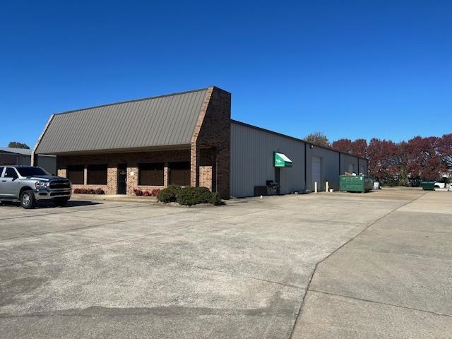 Versatile Office & Warehouse Space. Discover this prime commercial property in the heart of Jonesboro, AR, offering the perfect blend of office and warehouse space to meet your business needs. This 7,950 square foot building was previously used as an electrician's office, however, it is thoughtfully designed to support a wide range of operations. Front Office Space: Well-maintained office area with ample room for administrative tasks, client meetings, or workspace customization. Spacious Warehouse: A large warehouse in the back, featuring three oversized overhead doors, measuring 12X12, ideal for seamless loading and unloading. Convenient Location: Centrally located, providing easy access to major roads and the surrounding area. Ample Parking: Plenty of parking space for employees, clients, and equipment. This property is perfect for businesses needing a combination of professional office space and functional warehouse capacity. Don't miss out on this versatile space in a prime location!